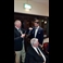 thumbnail Mr.President, Eric Barnes (L) ceremonially cuts the tie of the new Captain, Jake Aspinall (R).